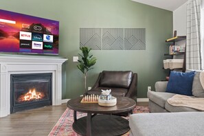 Sink into the sofa and relax by the roaring fire