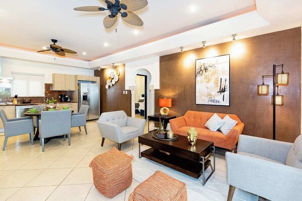 Living room area and kitchen.