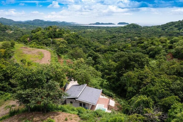 A serene hillside hideaway by the sea.