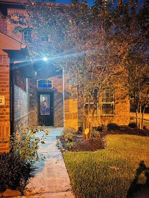View of the front entrance at night. This will be how you are first greeted when you walk up to the front door.