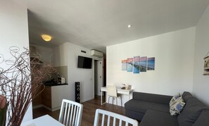 Modern Apartment with Open Kitchen and Cozy Living Room