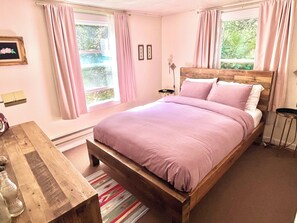 Main bedroom, note there are no doors only curtains in the main house.