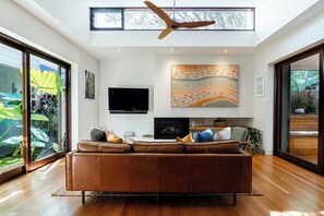Living Area with Gas Fireplace & Smart TV