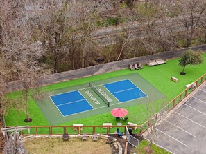 Enjoy some friendly competition at the communal pickleball court, available on a first-come, first-served basis.
