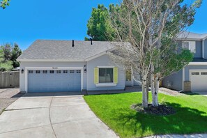 Welcome to our charming home with an attached garage and inviting curb appeal, offering a cozy stay in a peaceful neighborhood.
