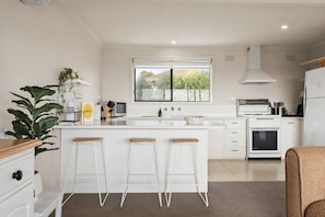 Open plan kitchen living and dining