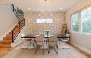 Modern elegance awaits with a stylish six-seat table, perfect for gathering and celebrating!