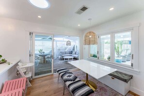 Dining room, with tons of natural light and leading off to the private enclosed deck 