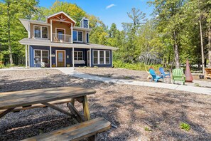 The blue cottage boasts accessible features and lots of family gathering space