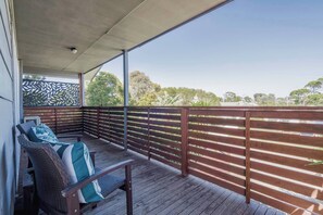 Take a seat in the outdoor chairs with a drink in hand while soaking in the peaceful surroundings.
