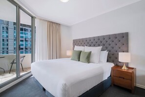 Rest on the king bed, binge your favourite shows, and wake up to soft natural light with direct balcony access.