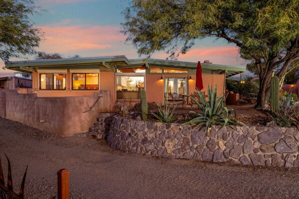 Private, peaceful patio just off Living Room 2 with outdoor dining area with seating for four, perfect for enjoying one of Tucson's famous sunsets