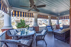 Covered porch area with lots of seating!

