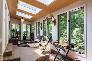 Bright, airy sunroom—perfect retreat for relaxation and sunlight.