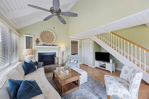 Enter into the open and airy living space with plenty of seating