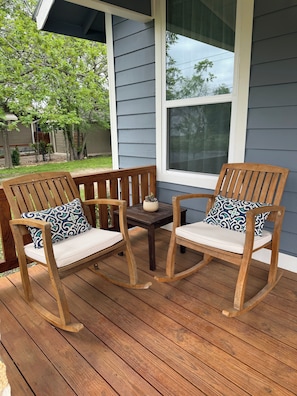 Enjoy the breeze on the front porch and watch for the deer across the street
