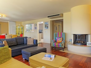 Furniture, Interior Design, Flooring, Couch, Floor, Room, Ceiling, Wood, Living Room, Table