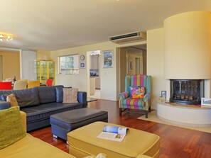 Furniture, Interior Design, Flooring, Couch, Floor, Room, Ceiling, Wood, Living Room, Table