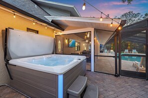 This is an incredible, amenity STACKED property! With a wood burning fire pit, pickleball court, pool, hot tub, playground, golf simulator, game room, and MORE!