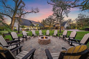 This is an incredible, amenity STACKED property! With a wood burning fire pit, pickleball court, pool, hot tub, playground, golf simulator, game room, and MORE!