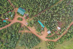 Tucked away in a peaceful forest clearing, this secluded retreat offers stunning views and a true escape into nature.
