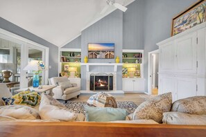 Cozy up by the indoor fireplace and enjoy your favorite shows on the smart TV!