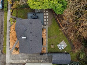 Behind the home is a green belt. 