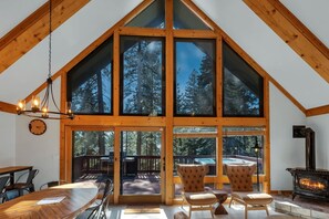 Gorgeous lake views from front deck and through the floor to ceiling windows.side of house.