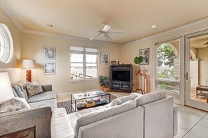 Sit back and relax in this cozy living room while watching the hustle and bustle of St. Augustine's Bay Front.