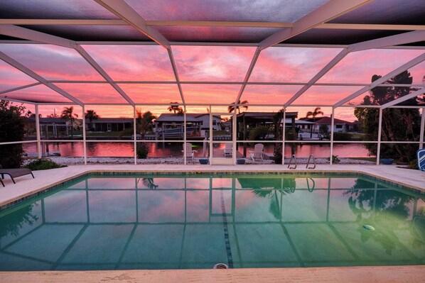 Whether it’s a peaceful morning or a dreamy evening, the best memories are made by the pool with a sky like this