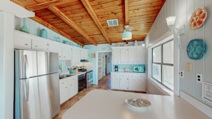 Everything you need to feel at home is at your fingertips in this elegant, functional space. Stainless-steel appliances, a large double sink, and plenty of cabinet space will inspire the chef in you.