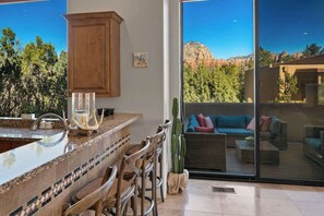 Socialize between the kitchen and the patio