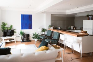 Open plan living area and fully equipped kitchen