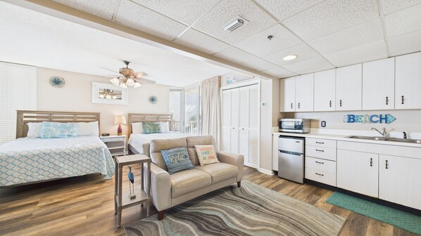 Open concept living area with TV