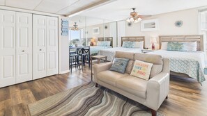 Open concept living area with TV
