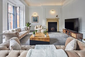 Living Room (75 inch QLED TV with access to Disney Plus, Netflix, and more)