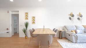 Chic Living Room Setup – A soft, inviting sofa, perfect for unwinding after a day of exploring. #ModernDesign #Madeira #Portugal #funchal