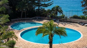 Refreshing Poolside View – Immerse yourself in the relaxing ambiance of the pool and ocean vista. #PoolsideVibes #Madeira #Portugal #funchal #pool