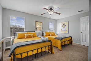 Comfortable 2 Full Beds with Ceiling Fan