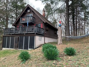 Screen porch and large deck in the back. Set up the hammock if you like.