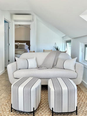 Casually layered coastal-inspired living room