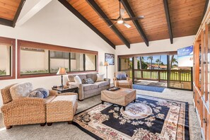 Spacious living room, dining, and bar area