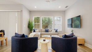 Curl up on the comfortable sofa or chairs to watch your favorite show 