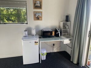 Kettle, Toaster, Air Fryer, Microwave, Refrigerator, and Wifi. Tea / coffee
