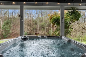 Relax in the bubbling hot tub after a fun day of adventure in Gatlinburg.