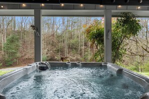 Relax in the bubbling hot tub after a fun day of adventure in Gatlinburg.