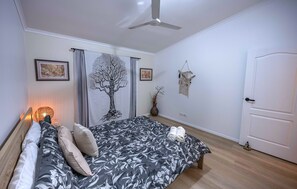 Main guest bedroom - aircon, fan, balcony, TV outlet, huge buil-in