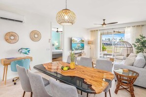 The indoor dining area comfortably seats, perfect for enjoying family meals prepared in the fully equipped chef's kitchen.