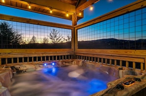 Unwind in our brand new hot tub while taking in stunning mountain views!