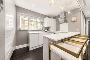 Fully equipped kitchen with washing machine/dryer, washing machine, fridge freezer, oven, wine fridge, cooking hob and much more!